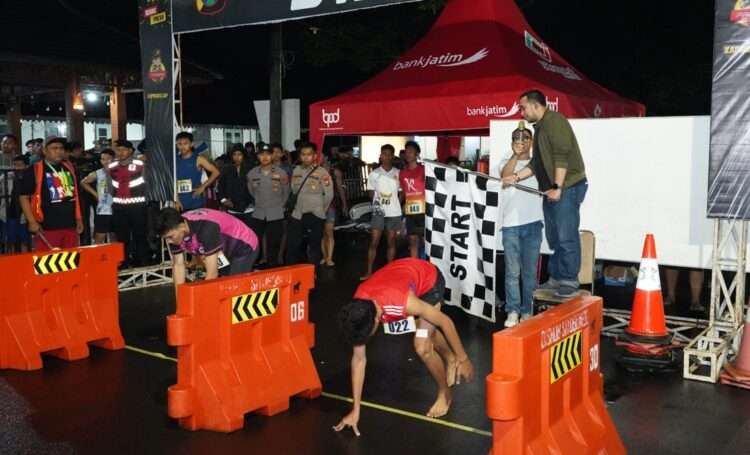 Ratusan Pemuda Adu Cepat di Lomba Lari 100 Meter Kapolres Cup Situbondo